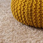 Carpet - yellow knitted bag
