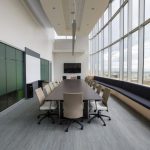 Narrow Room - rectangular brown wooden table with chair lot inside building