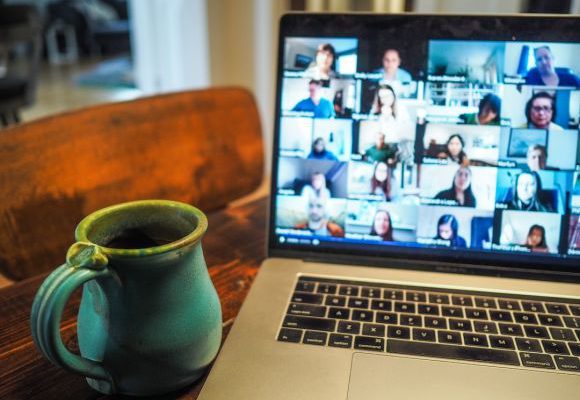 Video Conference - macbook pro displaying group of people