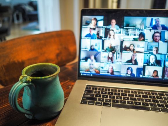 Video Conference - macbook pro displaying group of people