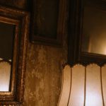 Vintage Mirrors - Brown Wooden Framed Wall Mirrors Near a Table Lamp