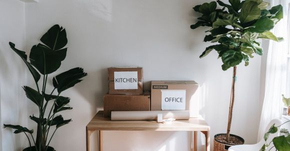 Furniture Materials - Brown Cardboard Boxes on Wooden Table